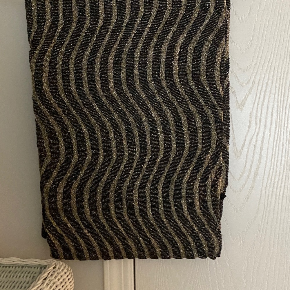 Beautiful infinity scarf very dressy gold flakes going through the scarf